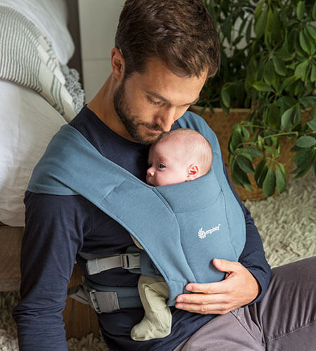 Dad with Baby in the Embrace Newborn Carrier
